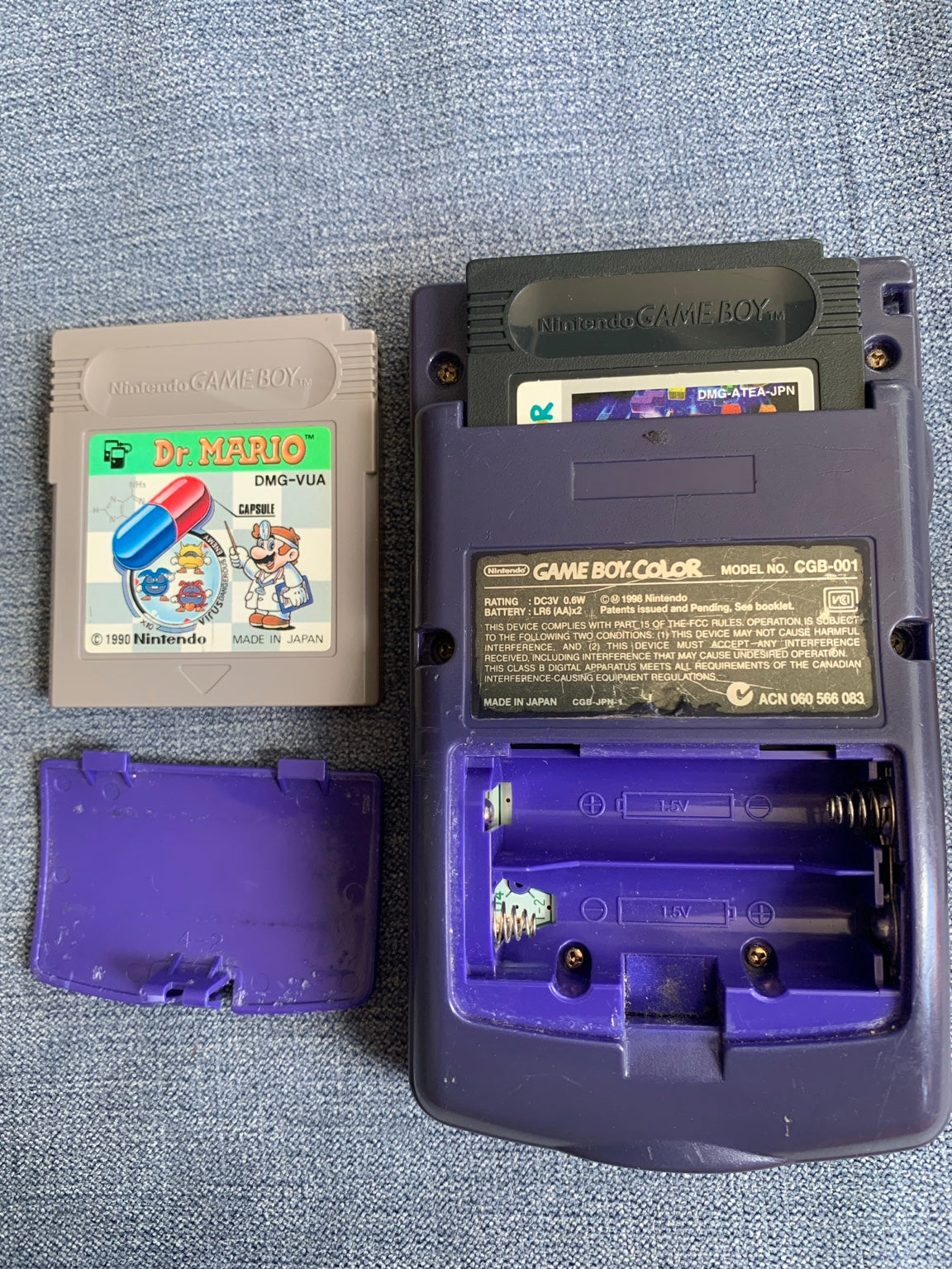 Nintendo Game Boy Color CGB-001 Atomic Purple + Dr. Mario & Tetris DX – Damaged Screen