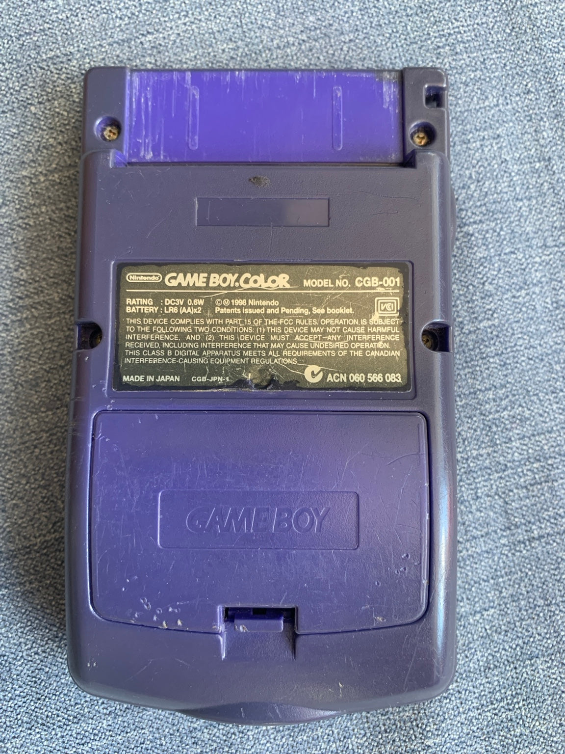 Nintendo Game Boy Color CGB-001 Atomic Purple + Dr. Mario & Tetris DX – Damaged Screen